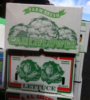 Stack of lettuce and cauliflower boxes. 2014.
